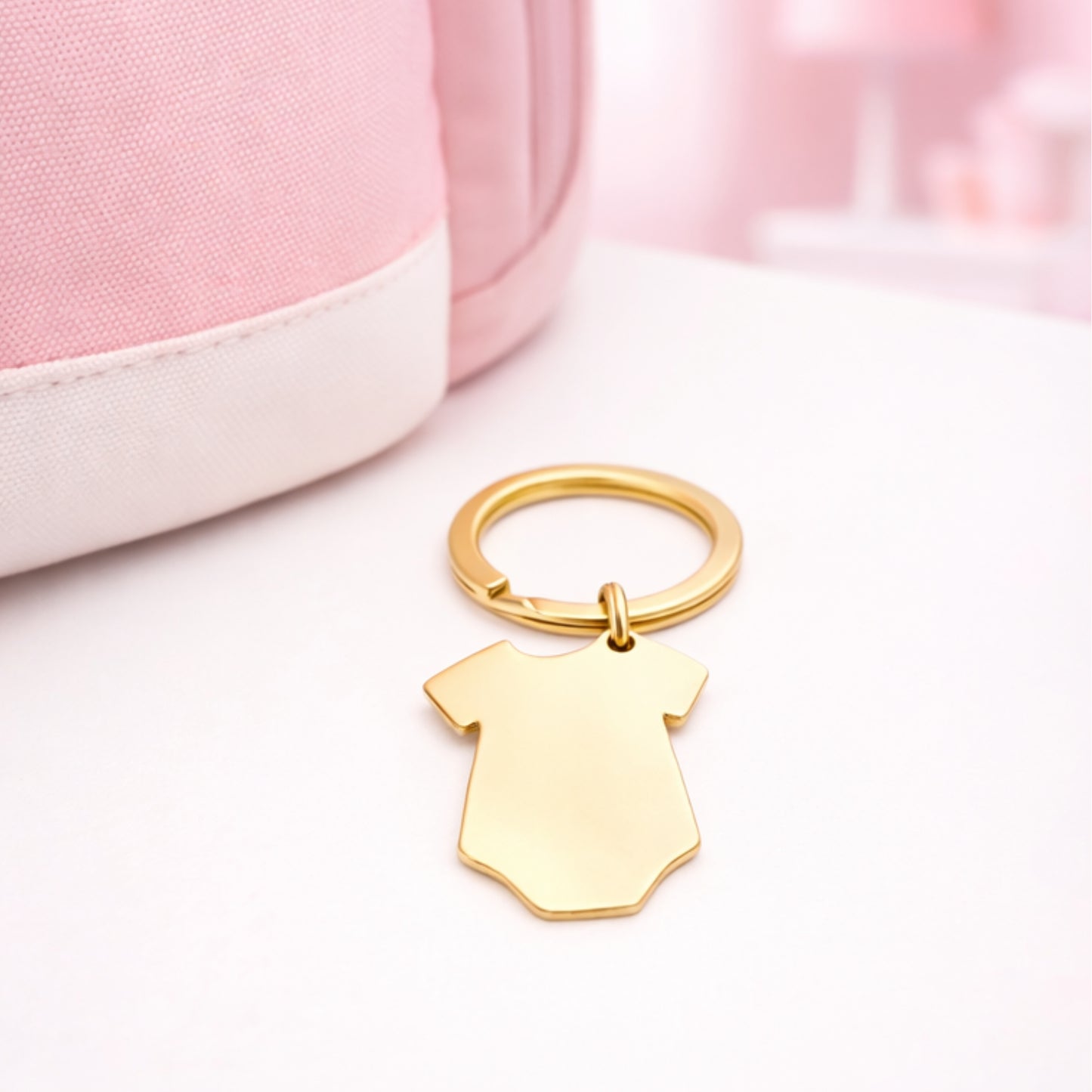 Llavero bebé dorado